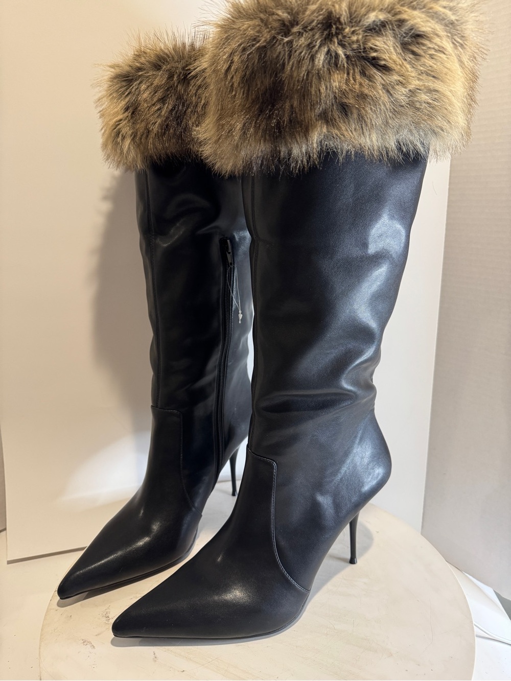 Thermal Faux Fur Cuff Bootie
Jeffrey Campbell size 11 Brand new